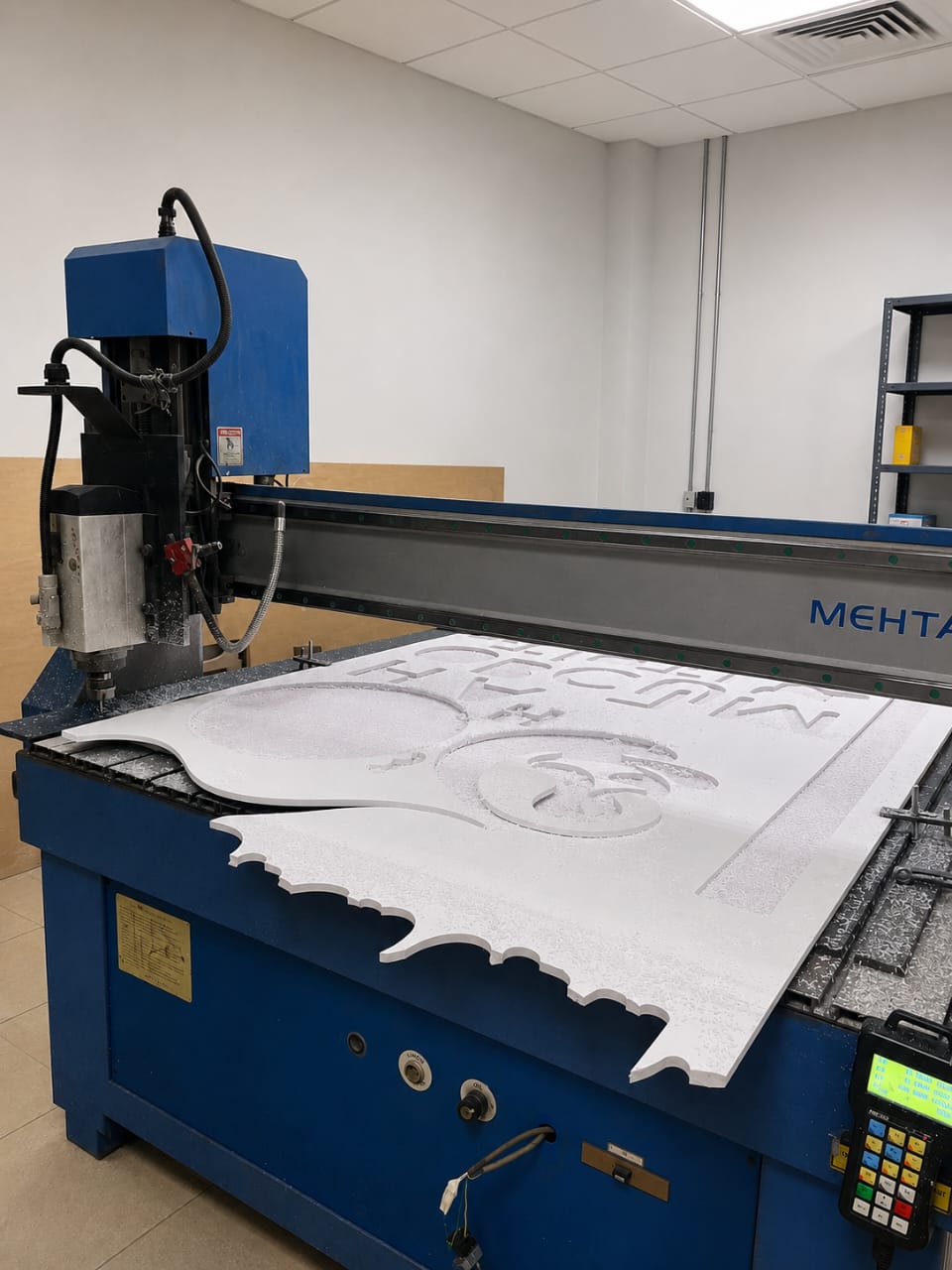 CNC router carving large-format signage.