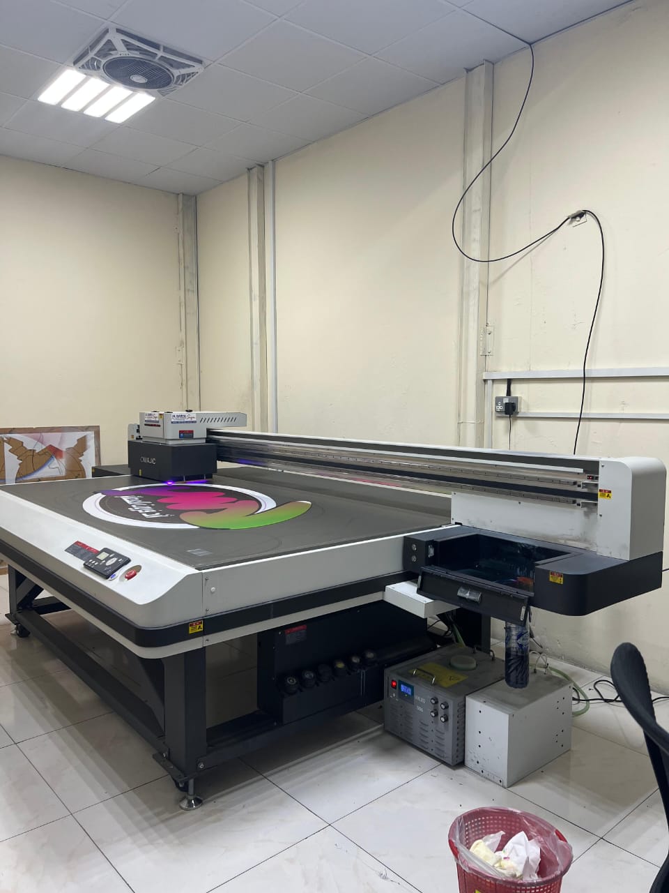 UV flatbed printer for full-color rigid prints.